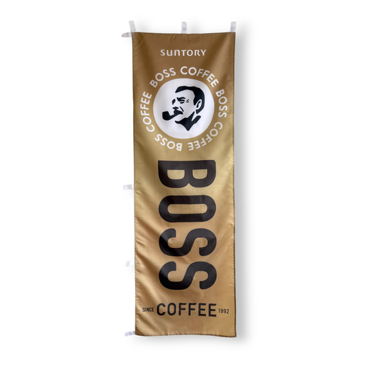 Suntory Coffee Boss coffee bag on a gold background