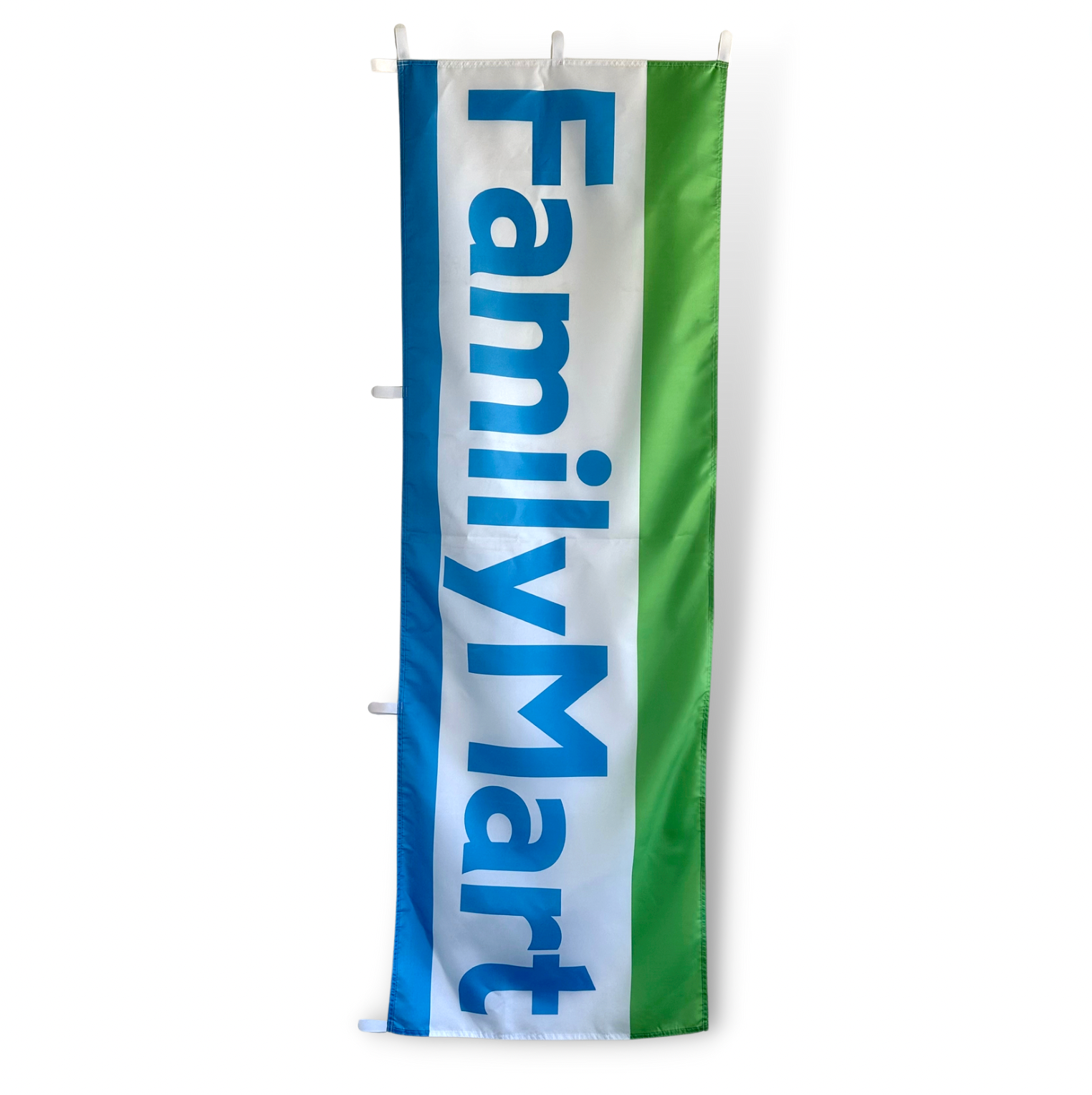 A rectangular flag featuring the Family Mart logo in blue and green colors on a white background