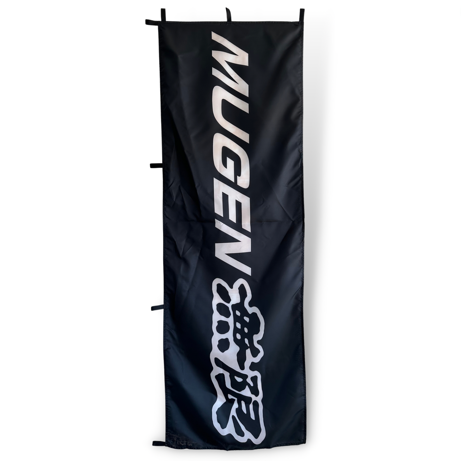 A rectangular flag with the Mugen brand logo in white on a black background, designed for use as a decorative piece.