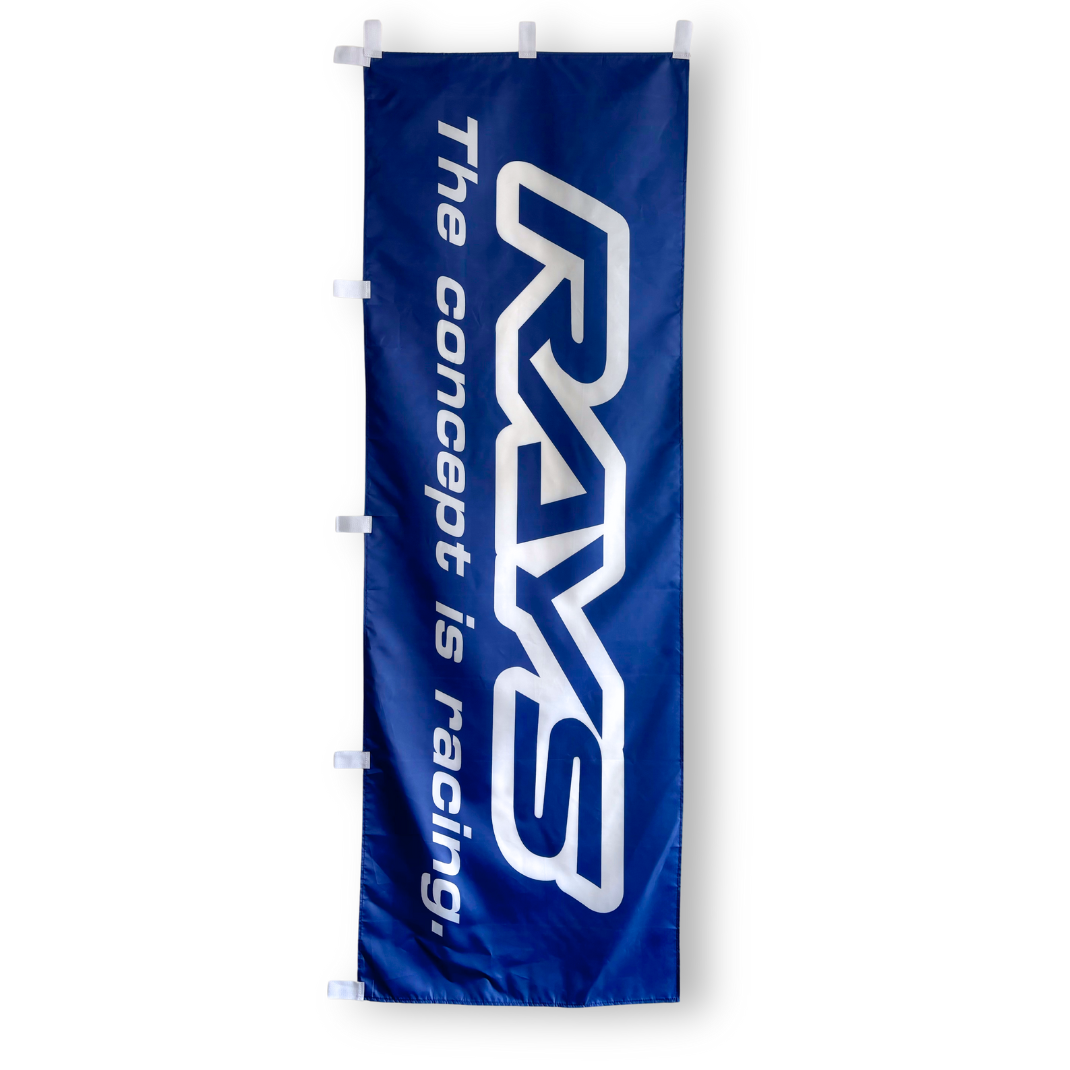 A rectangular flag with the text 'the concept is racing' and the brand 'Rays' displayed in a blue and white color scheme.
