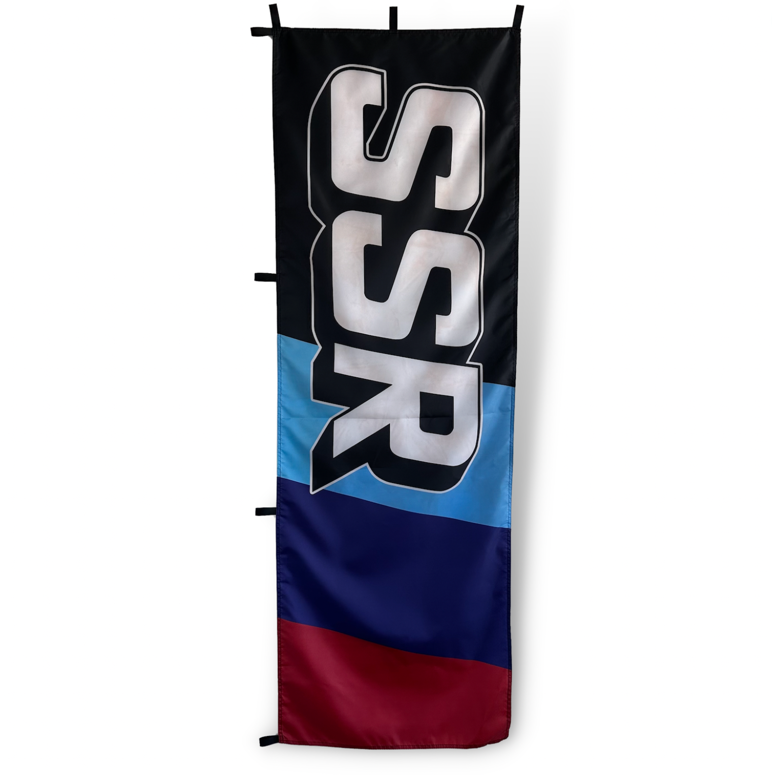 Black Rectangle Flag with white SSR text and blue, purple and red strip in background 