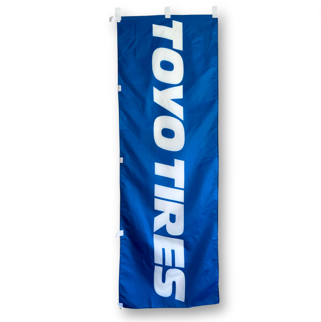 A rectangular flag with the Toyo Tires brand logo in white on a blue background